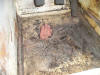 Photo of a rusty Austin Healey Sprite floor