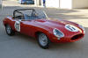 A photo of a Jaguar E-Type race car