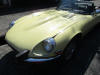 Photo of a yellow 1974  Jaguar E-Type