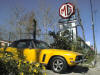 photo of a 1974 Jensen Interceptor and our sign